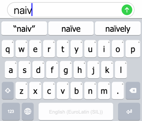 Typing “n-a-i-v” on a smartphone. The keyboard suggests “naïve” for this input.